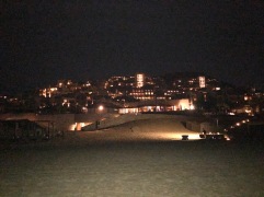 A look back at the resort at night from the beach.