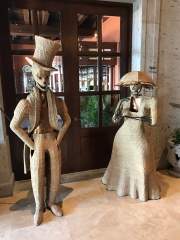 Interesting wicker figurines by the entrance to the lobby bar